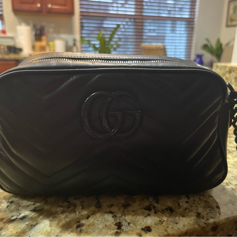 Gucci all black leather marmont bag.